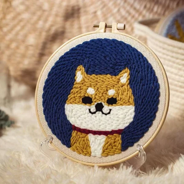 Shiba Inu Art Punch Needle Kit for Beginners Shiba Inu art punch needle kit with adorable dog design in wooden hoop, yarn, and complete beginner crafting supplies