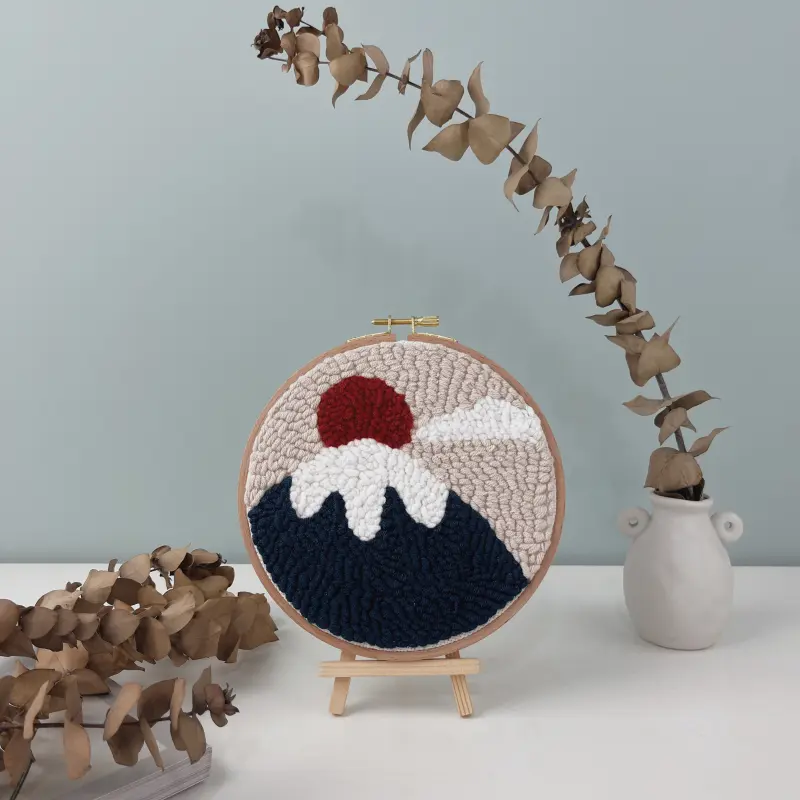 Mount Fuji Art Punch Needle - Finished Handmade Wall Decor Mount Fuji art punch needle finished wall decor displayed on wooden easel with eucalyptus branches home styling