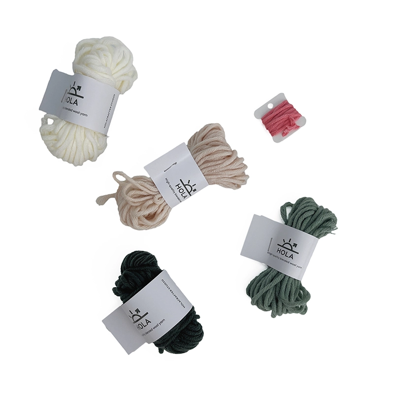 Punch Needle Starter Kit Yarn Colors - Mountain Landscape Design Punch needle starter kit yarn in white, beige, green, and black colors with HOLA brand labels for mountain landscape design