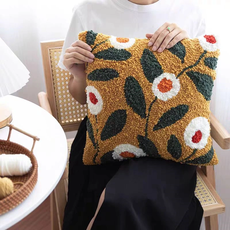 Brown Floral Needle Punch Pillow Kit | Vibrant Home Decor Handcrafted needle punch pillow with colorful floral pattern on wooden chair, showing textured rose design perfect for home decor