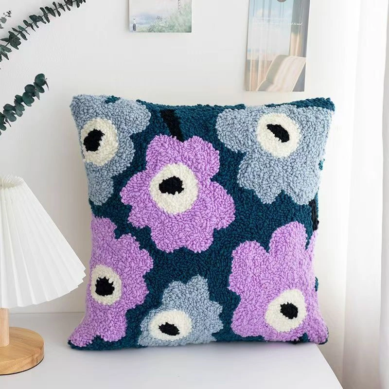 Purple Flowers Punch Needle Pillow Kit Purple flowers punch needle pillow kit showing finished cushion with floral design and crafting materials