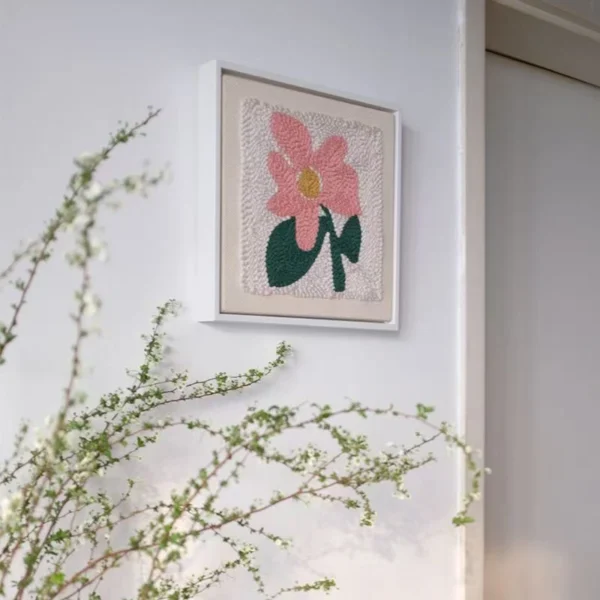 Punch Needle Flower Embroidery Kit for Wall Decor Framed punch needle pink flower embroidery kit hanging on wall, perfect for floral wall decor