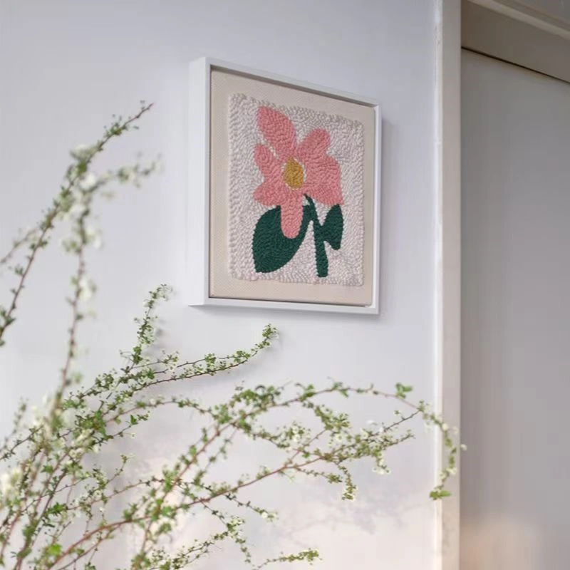 Punch Needle Flower Embroidery Kit for Wall Decor Framed punch needle pink flower embroidery kit hanging on wall, perfect for floral wall decor