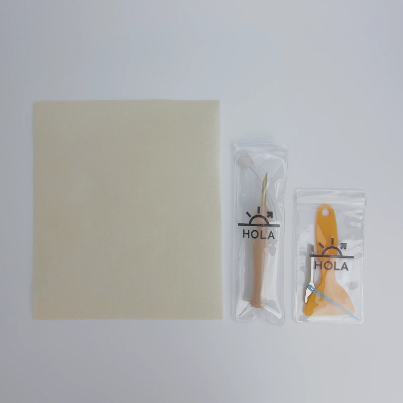 Displaying the accessory kit contents for Hoop Series punch needle projects.