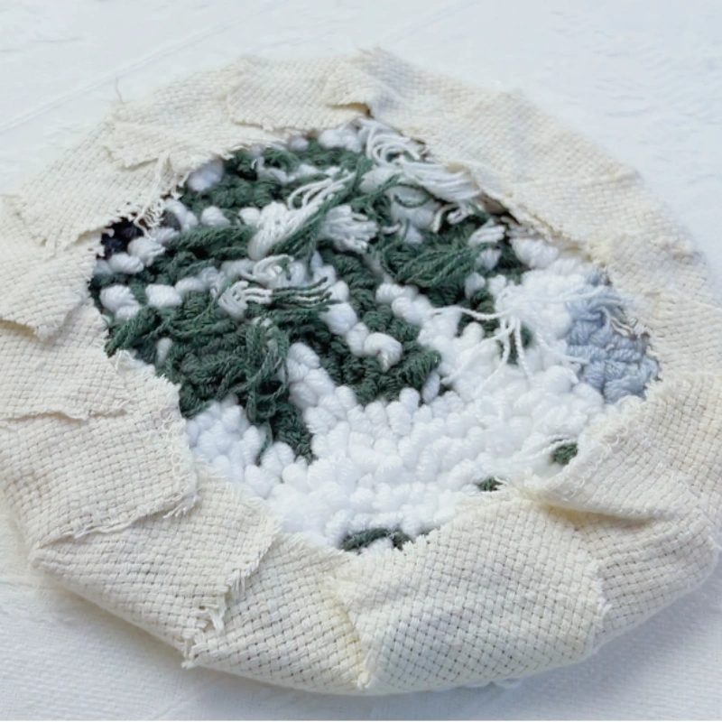 Back view showing neatly glued base fabric arranged in order.