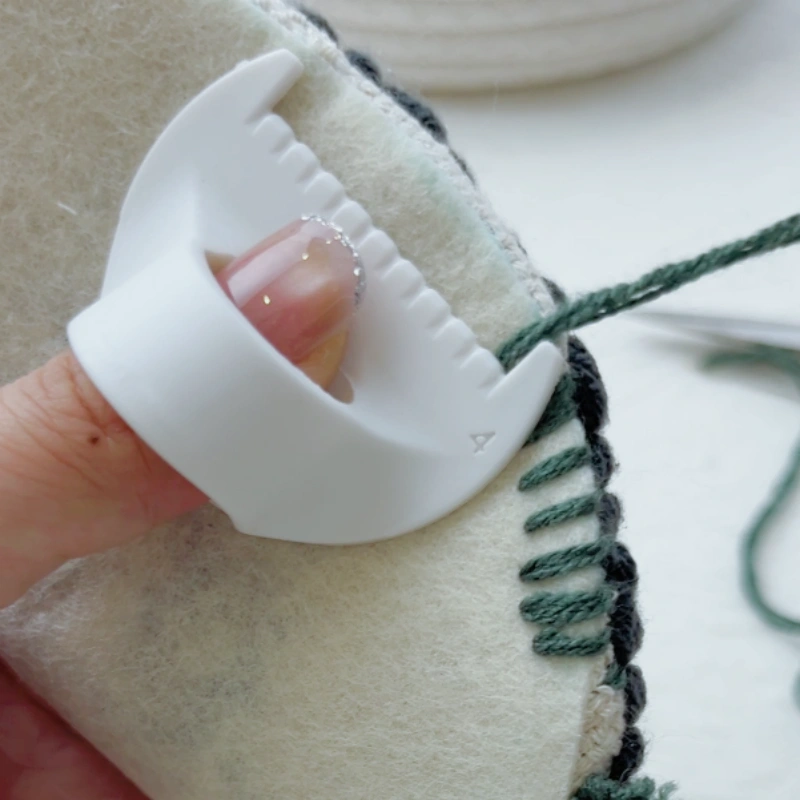 Positioning the next stitch using the previous stitch as a reference.