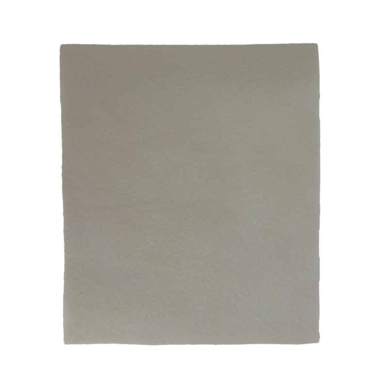 Attaching felt backing to secure yarn loops on the back of a punch needle project.