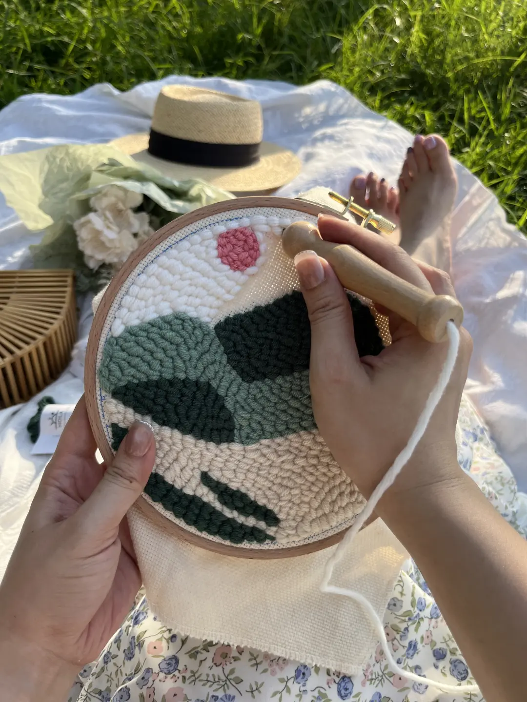 Creating a beginner-friendly punch needle kit from HolaKits outdoors.